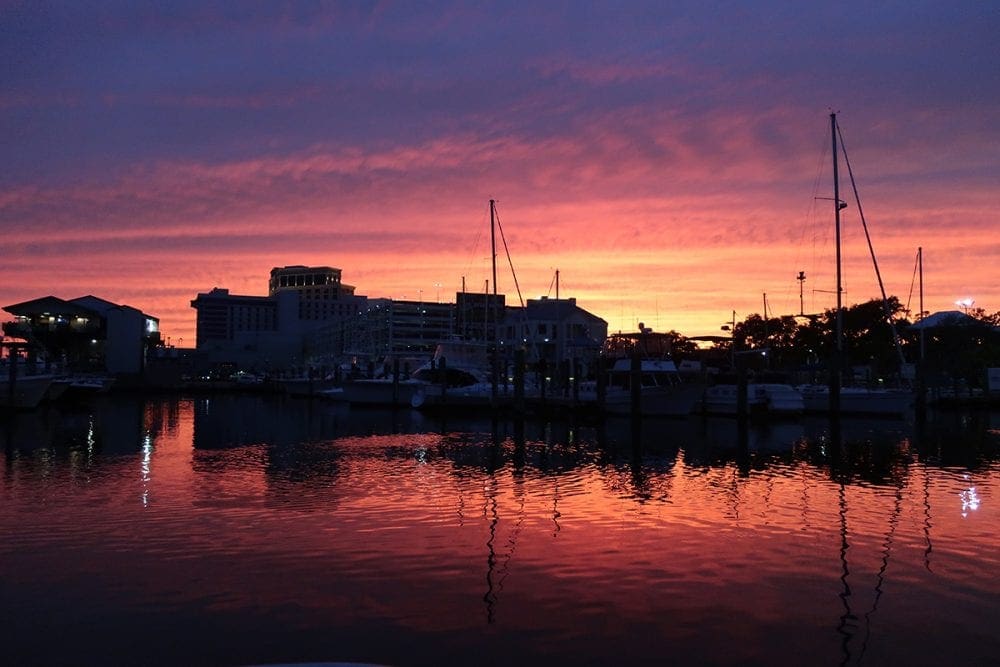Sunset in the harbor aboard Gypsy Lady a Hinckley Sailboat from Biloxi
